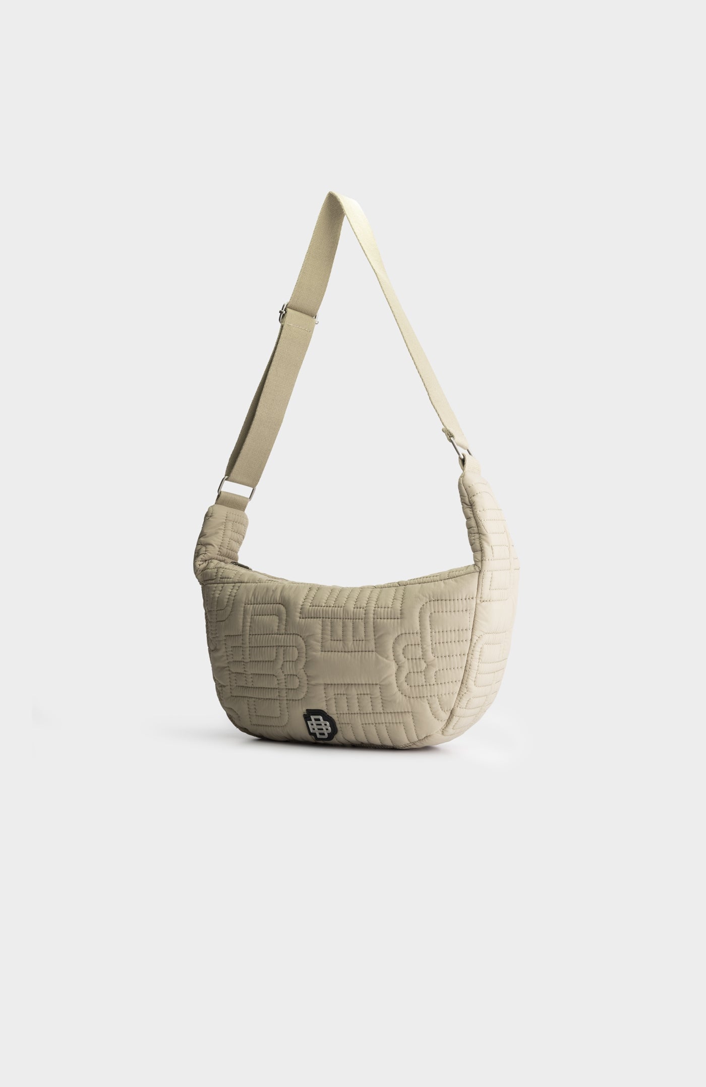 MONOGRAM QUILTED SLING BAG | Brown