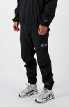 INITIAL TECH TRACKPANTS | Black