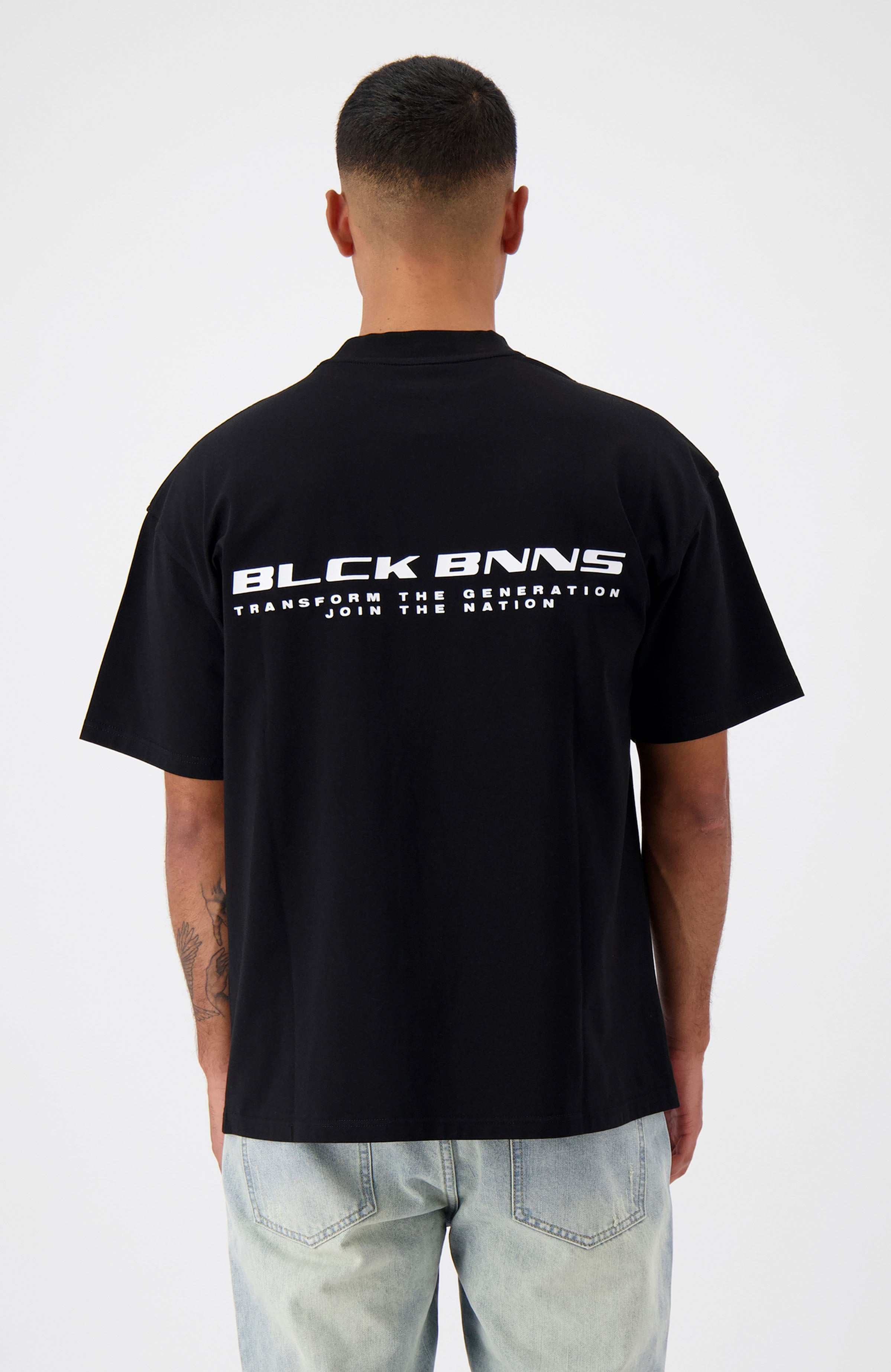 //blackbananas.com/cdn/shop/files/NATION_TEE_1.224.3.07-000000-top-01_{width}x.jpg?v=1726227757