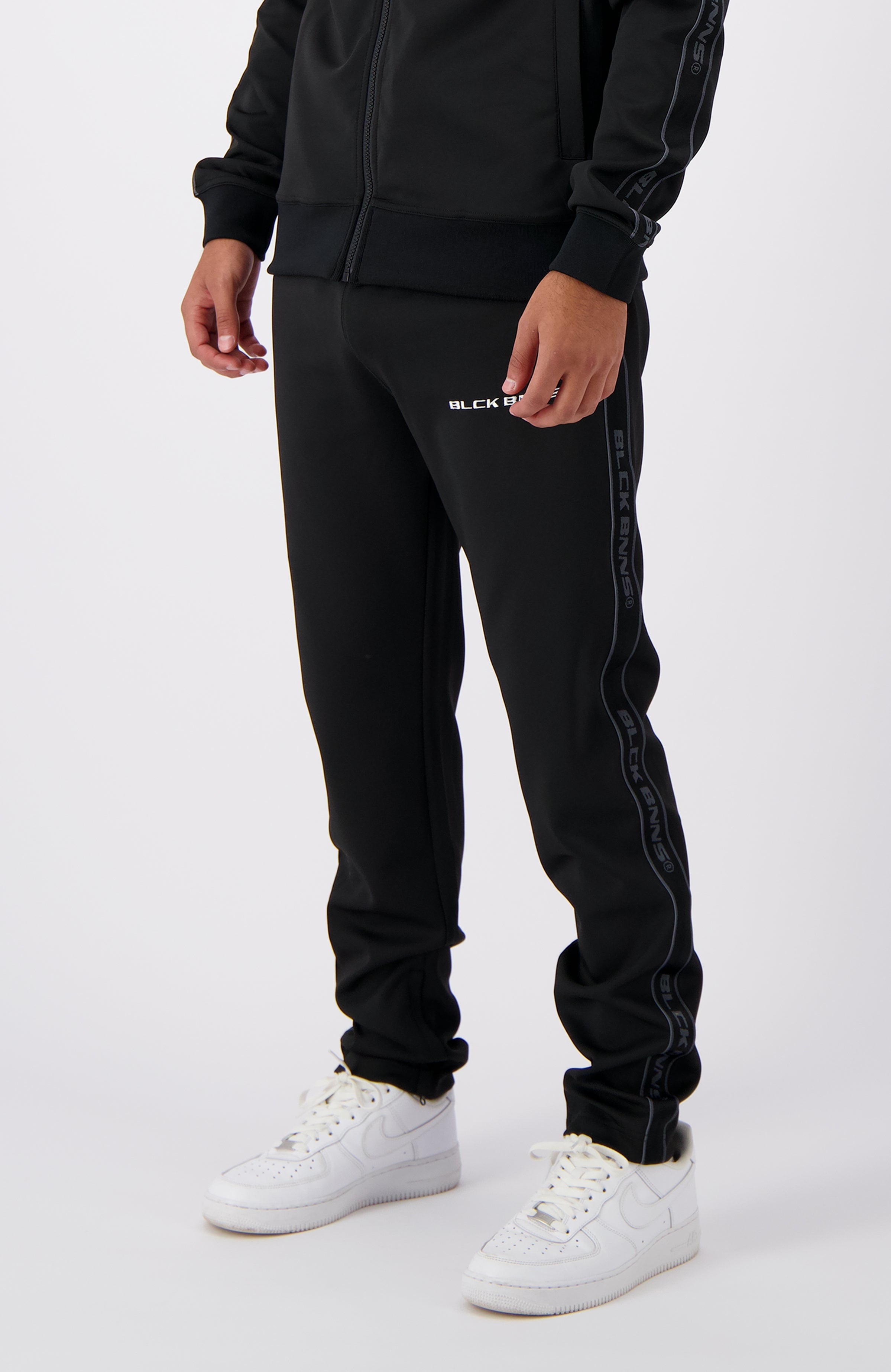 TAPED INITIAL TRACKPANTS | Black