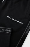 TAPED INITIAL TRACKPANTS | Black