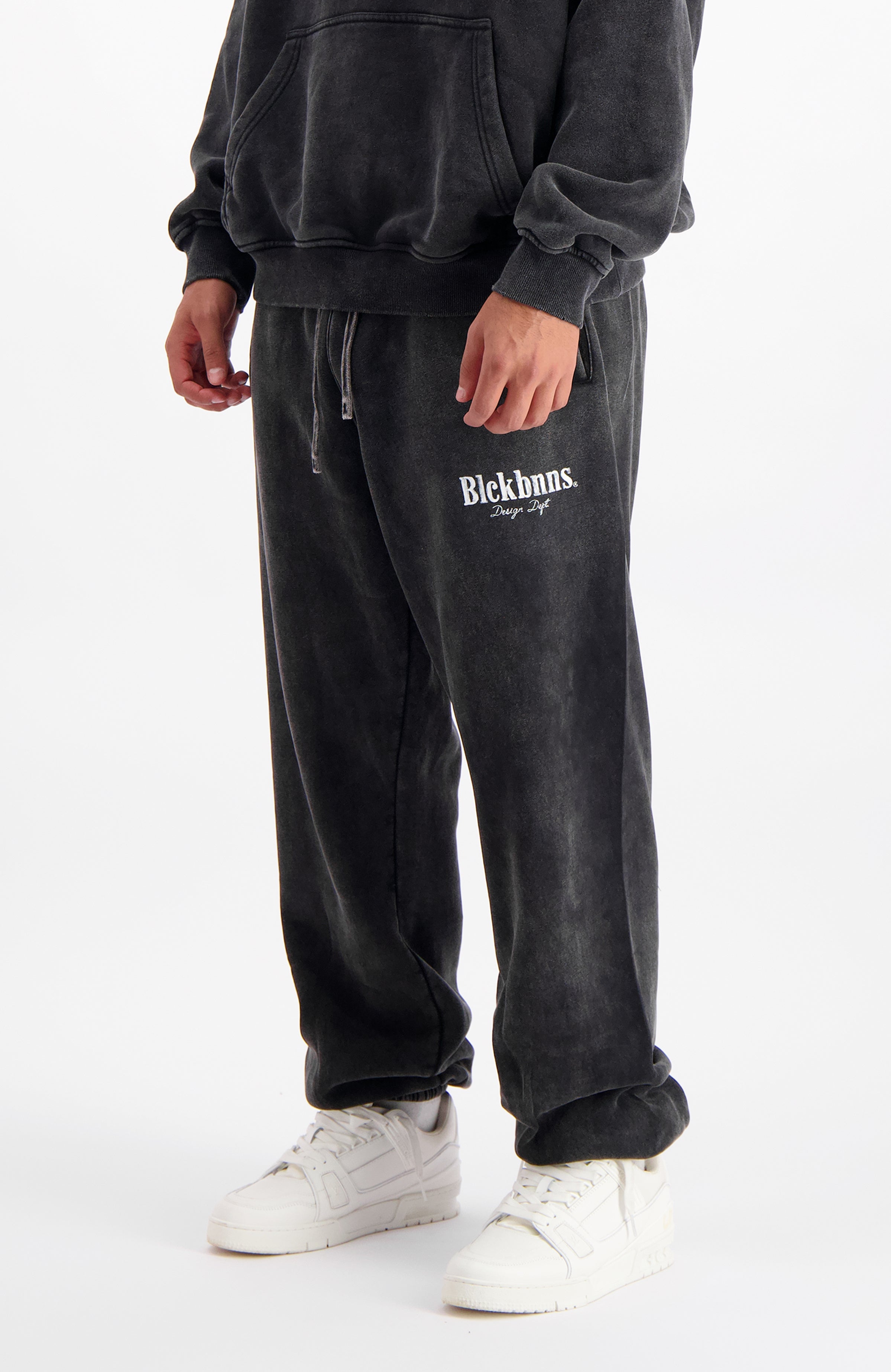 //blackbananas.com/cdn/shop/files/brush-sweatpants-1.224.4.46-000000-men-bottom-05_{width}x.jpg?v=1734354563