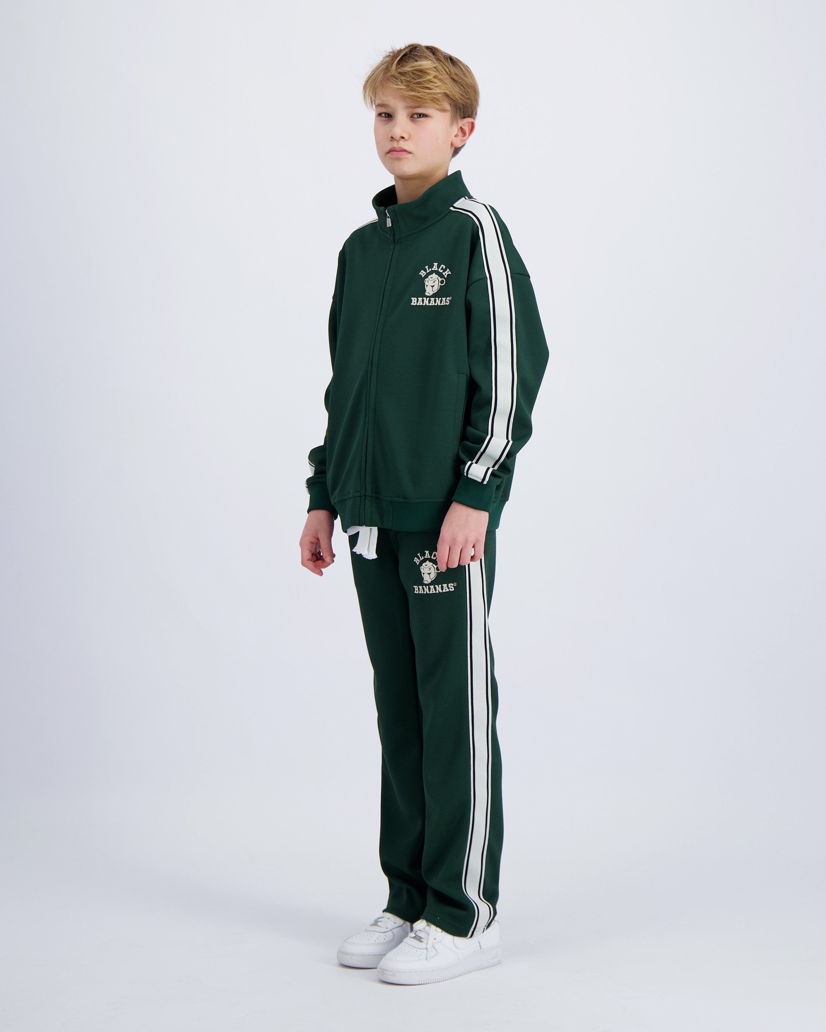 KIDS VARSITY-TRAININGSANZUG MIT LOGOBAND | Grün