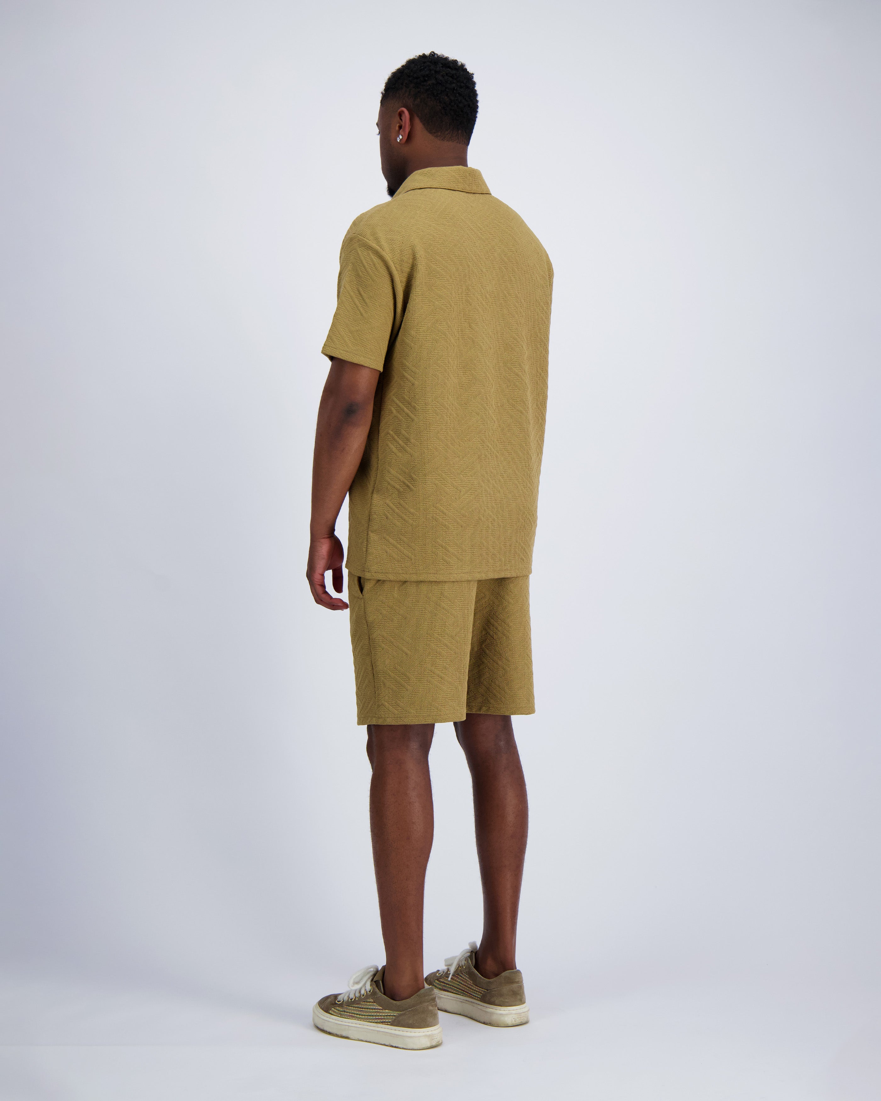 CONJUNTO DE POLO DE PUNTO | Marrón