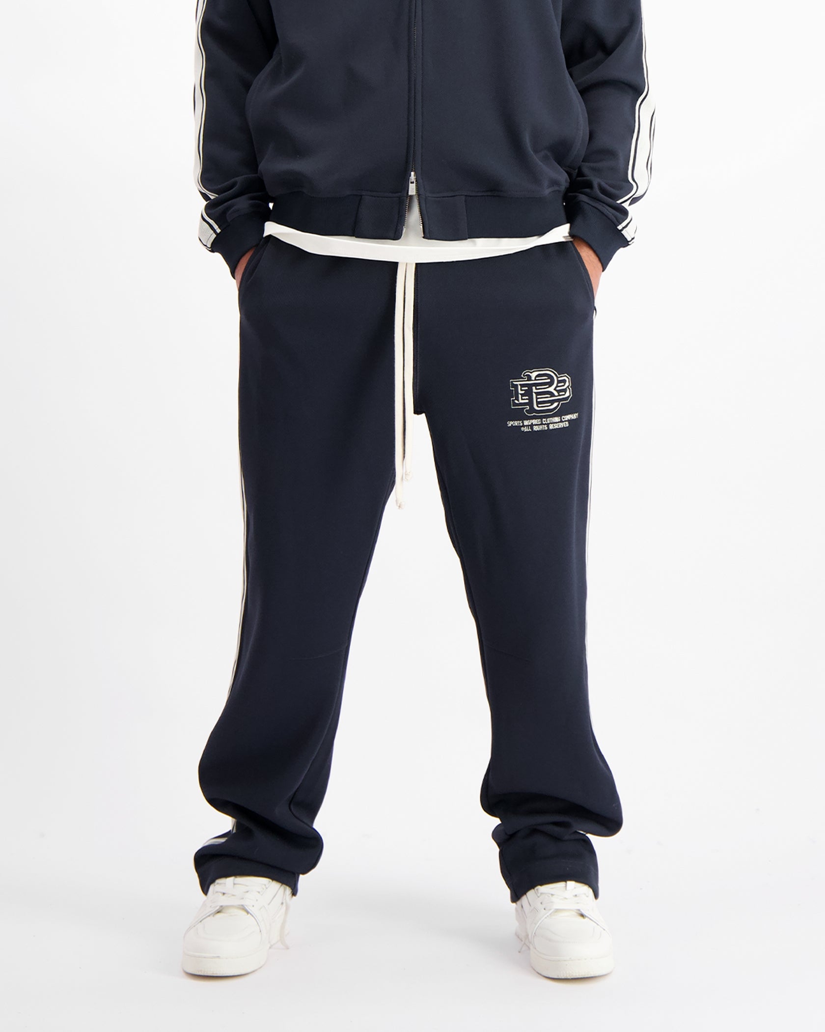 MONOGRAM TRACKPANTS | Navy