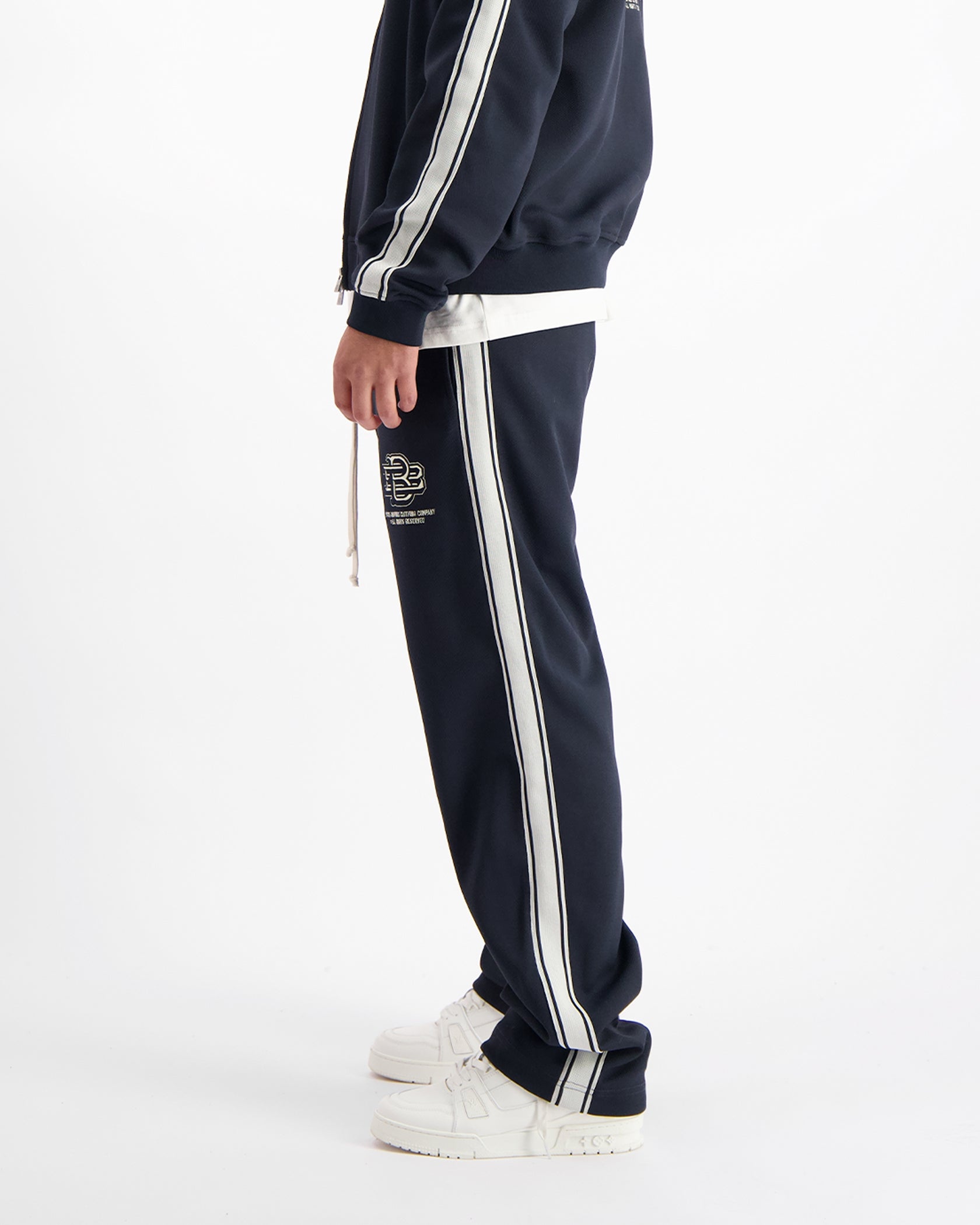 MONOGRAM TRACKPANTS | Navy