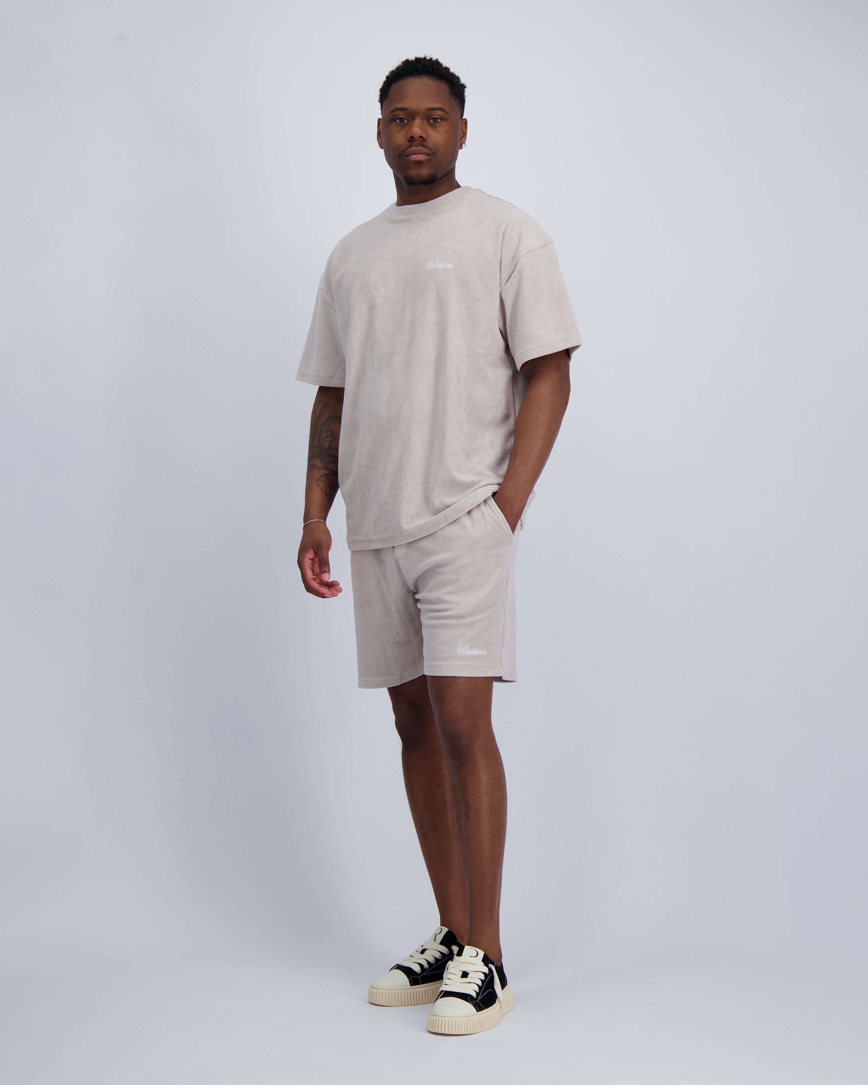 CONJUNTO DE DOS PIEZAS TERRY SCRIPT | Arena